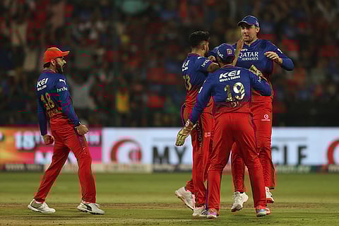 RCB players celebrate wicket of Kumar Kushagra