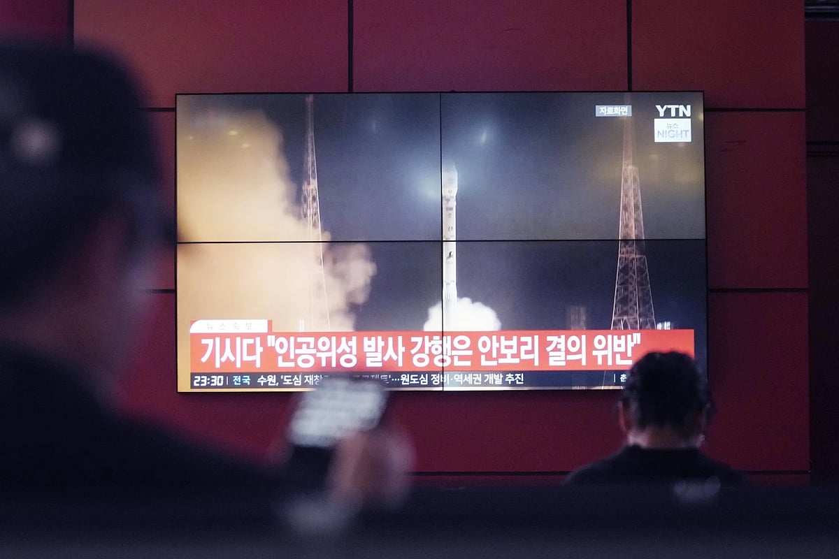 TV screen shows north korea's rocket launch at a bus terminal | - AP