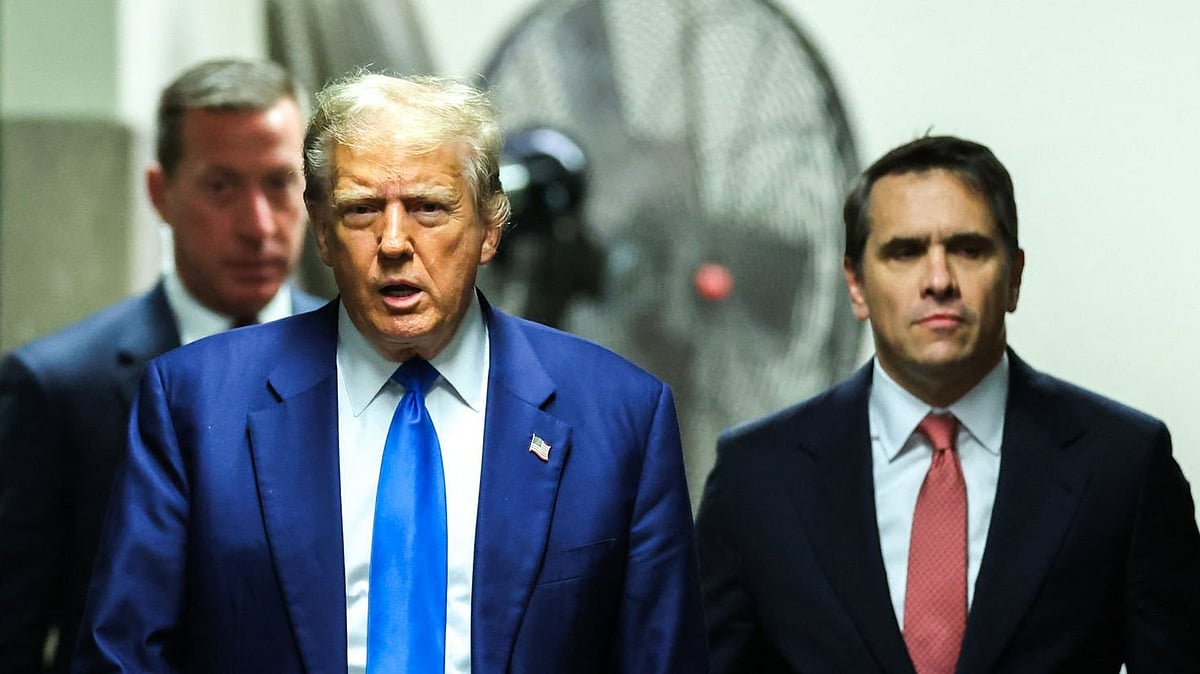Former US President Donald Trump and his attorney Todd Blanche (R) arrive for Trump's trial for allegedly covering up hush money payments linked to extramarital affairs, at Manhattan Criminal Court in New York City, on May 3, 2024.  - Getty images