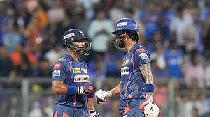 X | Lucknow Super Giants : LSG's Nicholas Pooran (first from left) and KL Rahul in action against MI in match 67 of IPL 2025 at Wankhede.