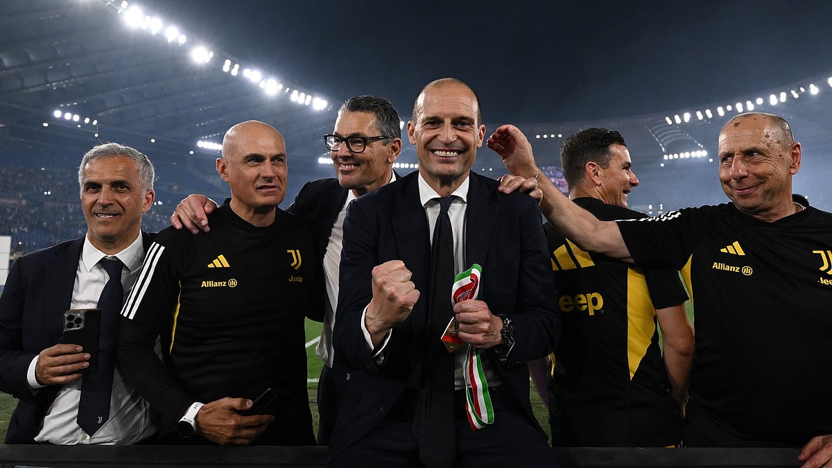 Massimiliano Allegri celebrates Juve's Coppa win.