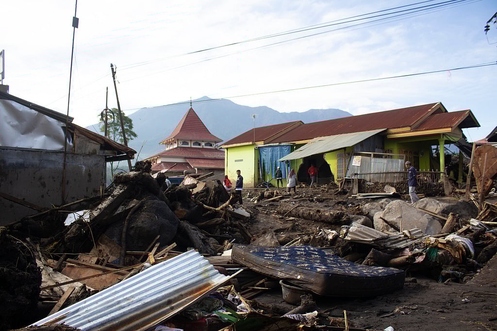 AP : Rescuers on Tuesday searched in rivers and the rubble of devastated villages for bodies, and whenever possible, survivors of flash floods that hit Indonesia's Sumatra Island over the weekend. 