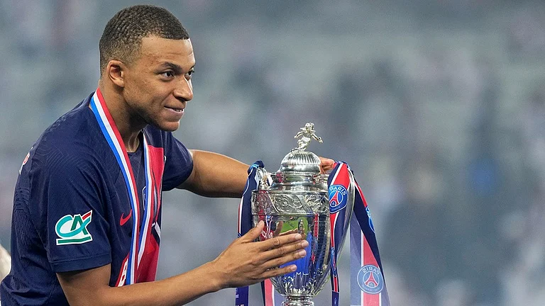 Kylian Mbappé celebrated with a big roar after the final whistle. - AP/Michel Euler