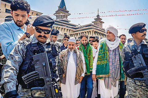 Apni Party chief Altaf Bukhari with Mohammad Ashraf Mir, parliamentary candidate from Central Kashmir at Jamia Masjid in Srinagar