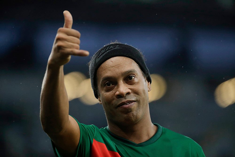 | Photo: AP/Bruna Prado : Brazil Floods Soccer