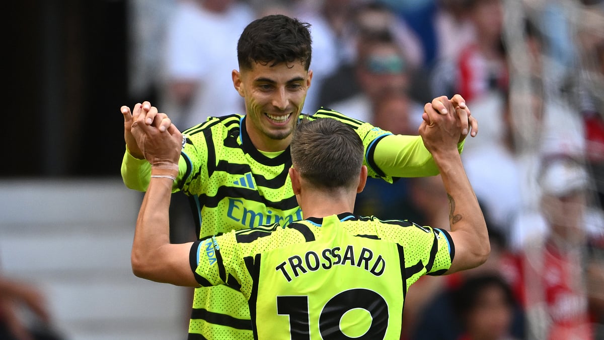 Kai Havertz celebrates a goal with Arsenal teammate Leandro Trossard during their English Premier League game against Manchester United at Old Trafford on Sunday (May 12). - null