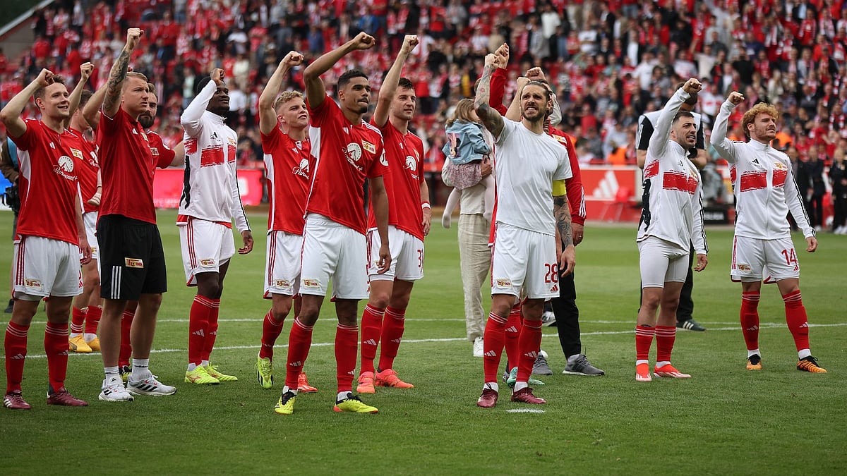 Union Berlin celebrate securing their survival.