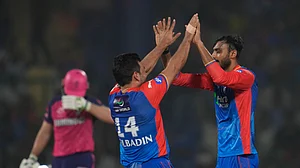 AP Photo/Manish Swarup : Delhi Capitals' Axar Patel celebrates the wicket of Rajasthan Royals' Jos Buttler during the Indian Premier League cricket match between Delhi Capitals and Rajasthan Royals in New Delhi.