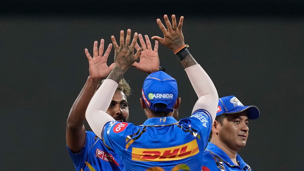 AP Photo/Rajanish Kakade : Mumbai Indians' Nuwan Thushara celebrates the wicket of Kolkata Knight Riders' Phil Salt with teammates during the Indian Premier League cricket match between Mumbai Indians and Kolkata Knight Riders in Mumbai.