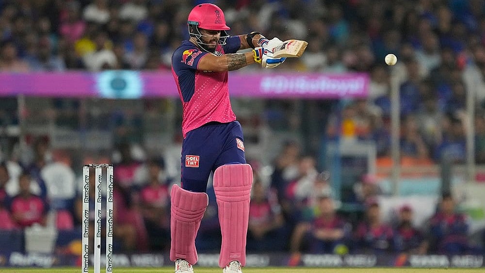 Riyan Parag plays a shot - | Photo: AP/Ajit Solanki