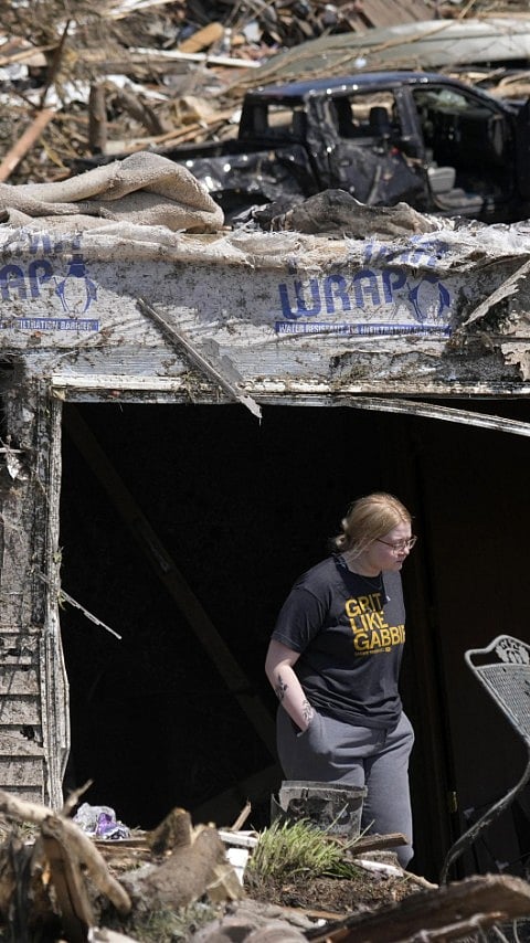 Woman Surrounded By Destruction Caused By The Tornado