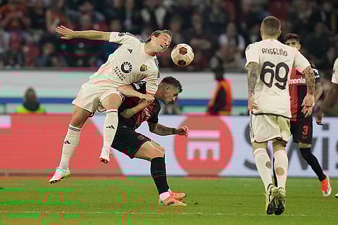 Exequiel Palacios and Edoardo Bove vie for the ball