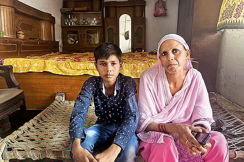 Zeenat Jahan, along with her son. Her husband has migrated for work