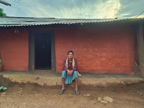 NSS activist Drenju Sikaka outside his house