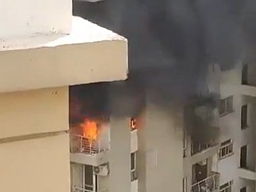 X : On Thursday morning, a fire broke out in an apartment on the 10th floor of Lotus Boulevard society in Sector-100 due to a blast in an air conditioner in the house.

