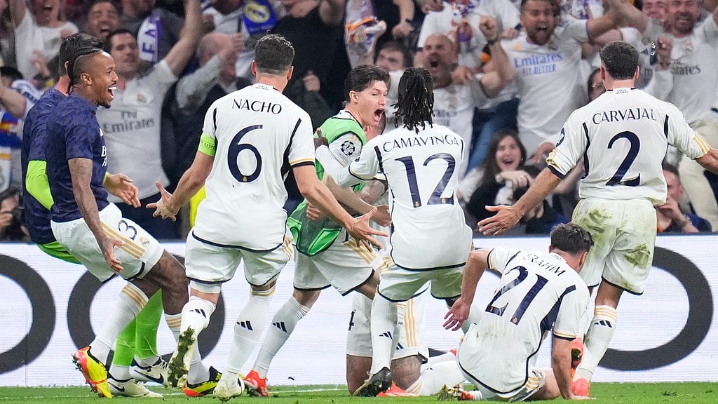 AP/Manu Fernandez : Real Madrid players celebrate a goal against Bayern Munich in UCL SF.