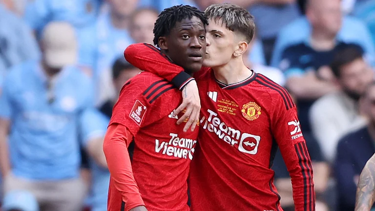 Teenagers Kobbie Mainoo (L) and Alejandro Garnacho both scored in the FA Cup final. - null