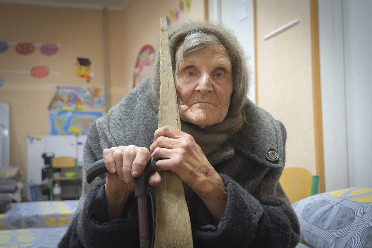 AP : Lidia Stepanivna Lomikovska, who escaped Russian-occupied territory by walking almost 10 kilometers