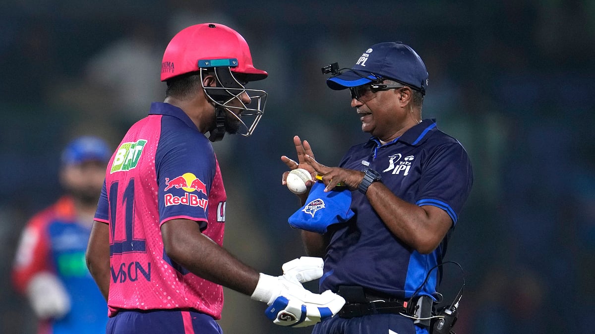Rajasthan Royals' captain Sanju Samson talks to umpire after getting out during the Indian Premier League cricket match between Delhi Capitals and Rajasthan Royals in New Delhi, India, Tuesday, May 7, 2024. -  (AP Photo/Manish Swarup)