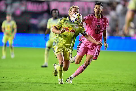 Emil Forsberg vie with Sergio Busquets