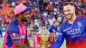 X/@RCBTweets : RCB Captain Faf du Plessis on right with RR captain Sanju Samson