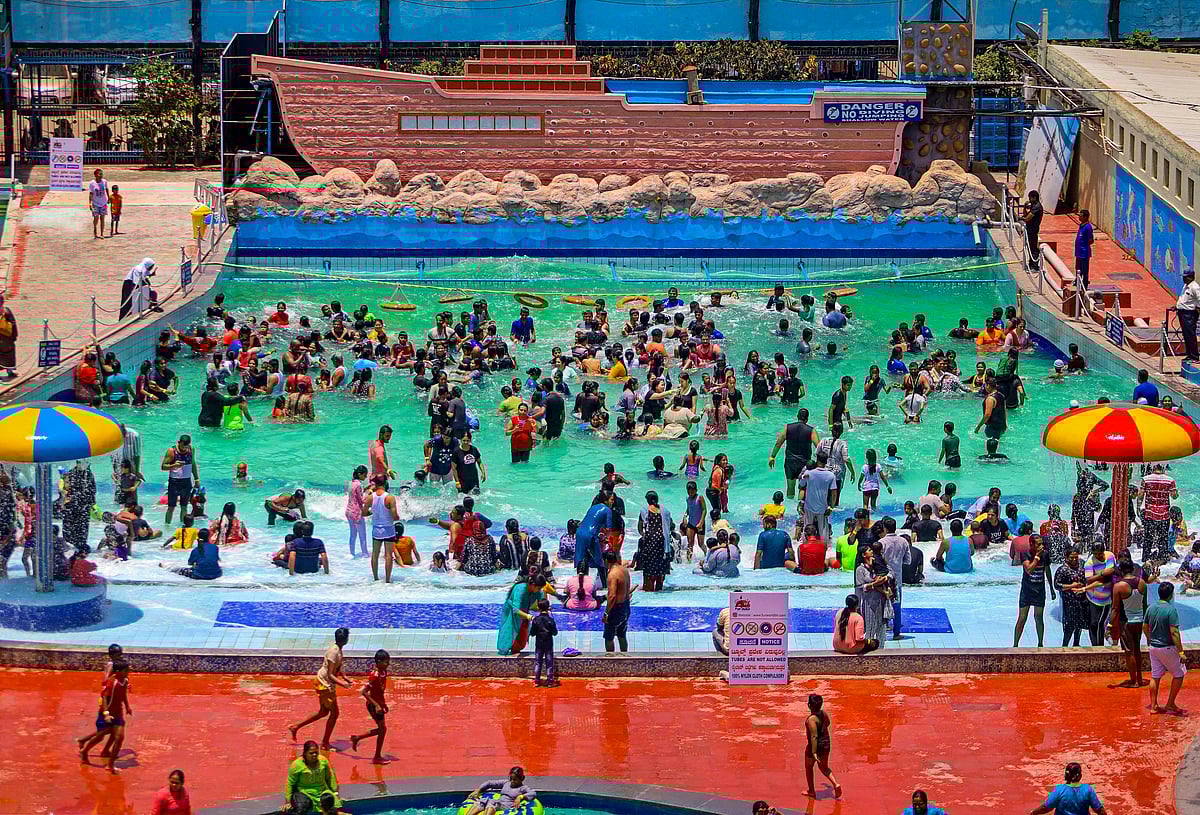 PTI : Bengaluru: People play water games at an amusement park on a hot summer day, in Bengaluru, Tuesday, May 7, 2024. 