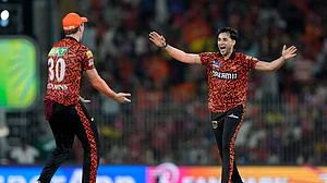 AP Photo /Mahesh Kumar A. : Sunrisers Hyderabad's Abhishek Sharma celebrates with captain Pat Cummins the wicket of Rajasthan Royals' captain Sanju Samson during the Indian Premier League second qualifier cricket match between Rajasthan Royals and Sunrisers Hyderabad in Chennai.