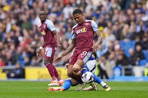 Leon Bailey is tackled by Billy Gilmour