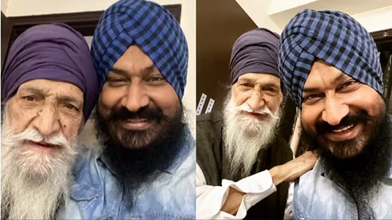 Gurucharan Singh with his father, Harjit - null