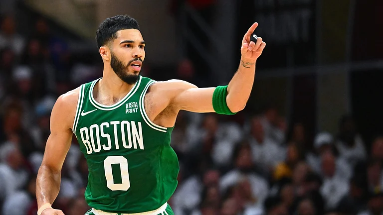Jayson Tatum #0 of the Boston Celtics reacts after scoring a basket against the Cleveland Cavaliers during the third quarter in Game Three of the Eastern Conference Second Round Playoffs at Rocket Mortgage Fieldhouse on May 11, 2024 in Cleveland, Ohio. - null
