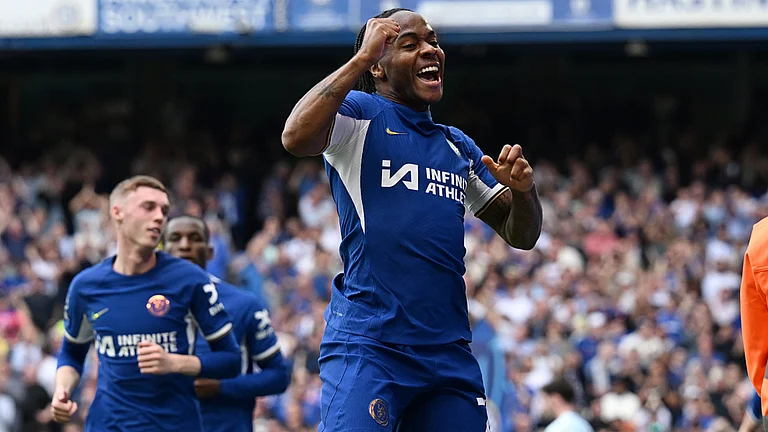 Raheem Sterling celebrates scoring Chelsea's second against Bournemouth - null