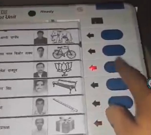Screen grab from viral video of a voter casting vote 9 times for BJP candidate