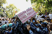 Getty Images : A box of fake currency notes amid protest over Adani Group issue and Rahul Gandhi's disqualification in March, 2023