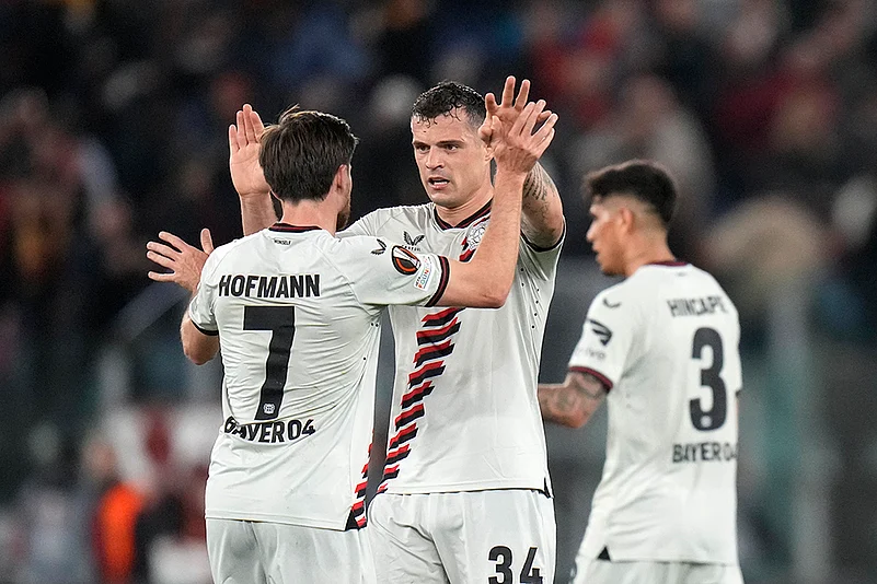 Leverkusens Jonas Hofmann and Granit Xhaka celebrate their victory