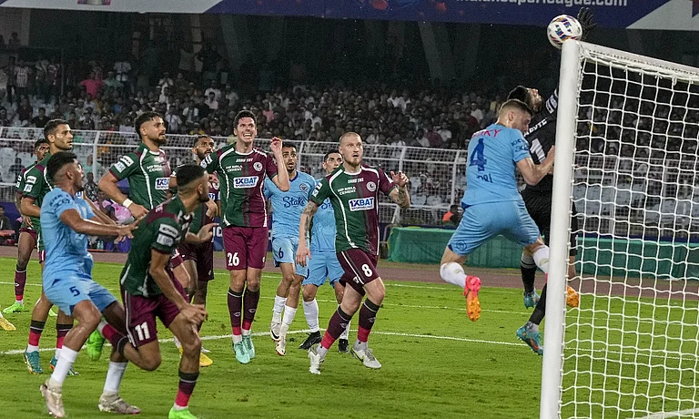 Mohun Bagan goalkeeper Vishal Kaith saves an attempt during their Indian Super League 2023-24 final match against Mumbai City FC at Salt Lake Stadium in Kolkata on May 4, 2024. - PTI