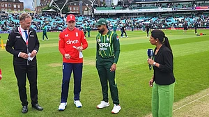 X/Pakistan Cricket : Captains Jos Buttler (second from left) and Babar Azam at the toss for the fourth T20I between England and Pakistan at the Kennington Oval in London on Thursday (May 30, 2024).