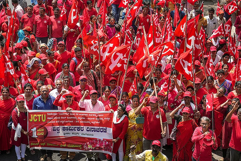 International Labour Day - | Photo: PTI/Shailendra Bhojak