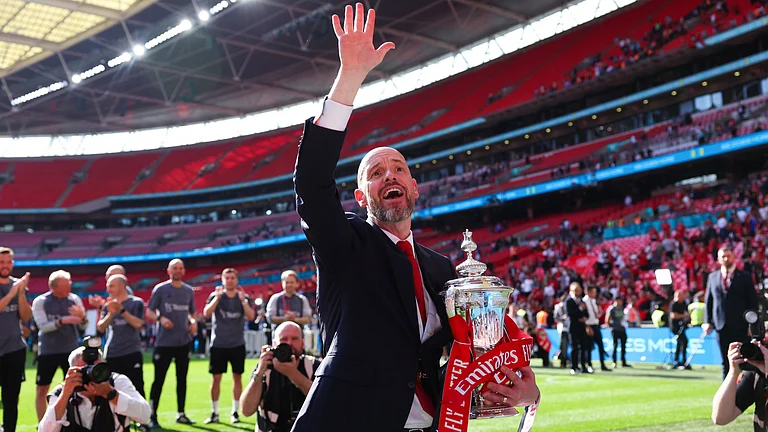 Erik ten Hag celebrates Manchester United's FA Cup final win. - null