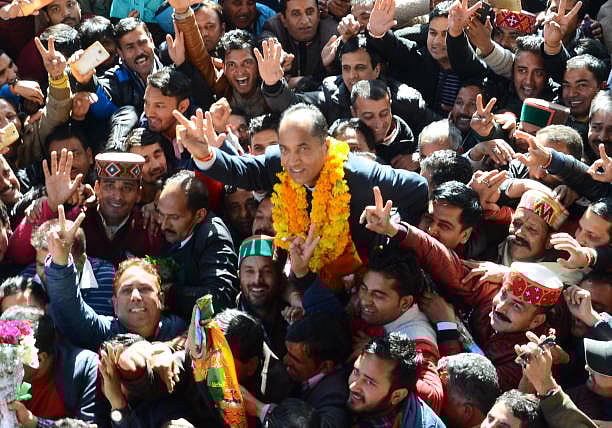 (Photo by Deepak Sansta via Getty Images) : After BJP announces the Himachal Pradesh chief minister name party workers shouting slogans and celebrating with the elected chief minister Jai Ram Thakur on December 24 2017 in Shimla