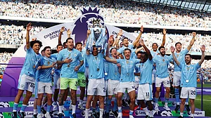 X/Premier League : Manchester City players celebrate with the trophy after winning English Premier League 2023-24 for the fourth time in a row.
