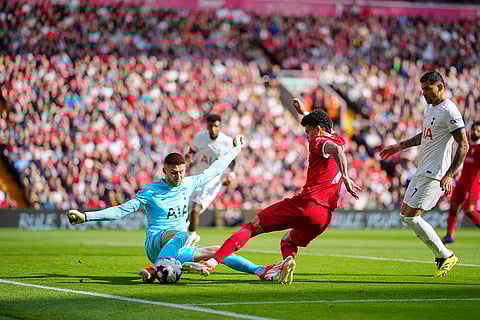 Tottenham's goalkeeper Vicario blocks a shot