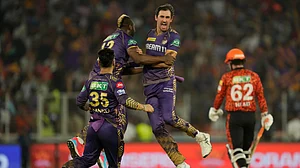 AP Photo/Ajit Solanki : Kolkata Knight Riders' Mitchell Starc, second right, celebrates with teammates after the dismissal of Sunrisers Hyderabad's Travis Head, right, during the Indian Premier League qualifier cricket match between Kolkata Knight Riders and Sunrisers Hyderabad in Ahmedabad.