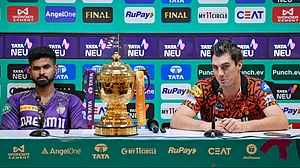 AP Photo/Mahesh Kumar A. : Sunrisers Hyderabad's captain Pat Cummins, right, addresses a press conference as Kolkata Knight Riders' captain Shreyas Iyer looks on in Chennai.