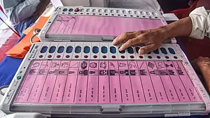 PTI : plea has been filed in the Supreme Court seeking review of its April 26 judgement by which it had rejected the demand for reverting to the old paper ballot system and the complete cross-verification of votes cast using EVMs |