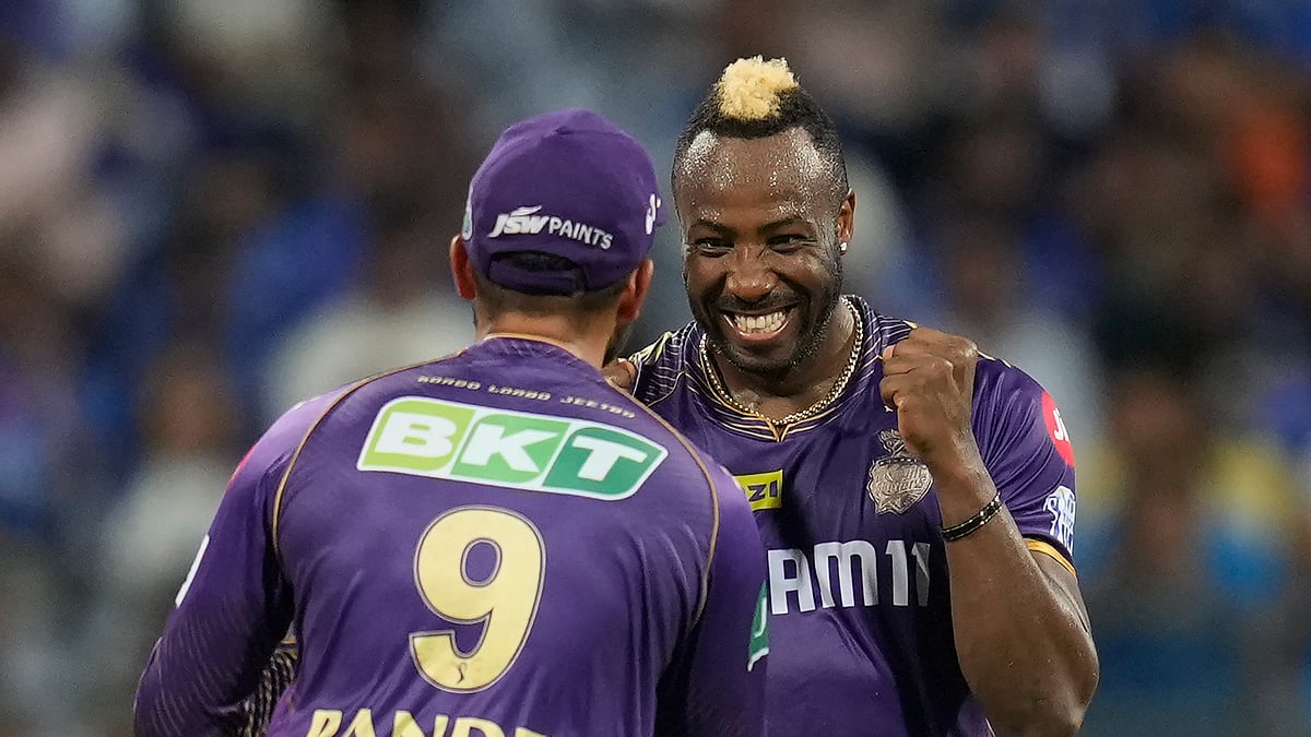 AP Photo/Rajanish Kakade : Kolkata Knight Riders' Andre Russell celebrates the wicket of Mumbai Indians' captain Hardik Pandya during the Indian Premier League cricket match between Mumbai Indians and Kolkata Knight Riders in Mumbai.