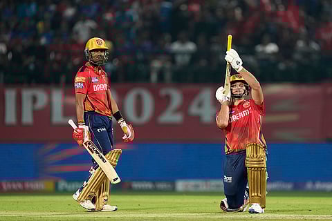 Rilee Rossouw celebrates his fifty