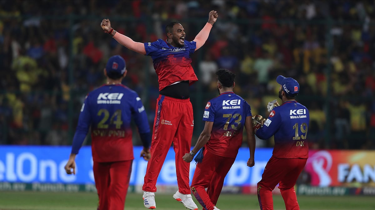 Royal Challengers Bengaluru's Yash Dayal celebrates after winning the Indian Premier League cricket against Chennai Super Kings in Bengaluru. - AP Photo/Kashif Masood