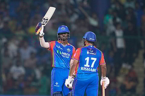 Abishek Porel celebrates fifty runs