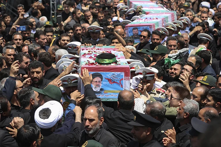 Flag Draped Coffins of Ebrahim Raisi and his entourage | - Iranian Presidency Office via AP