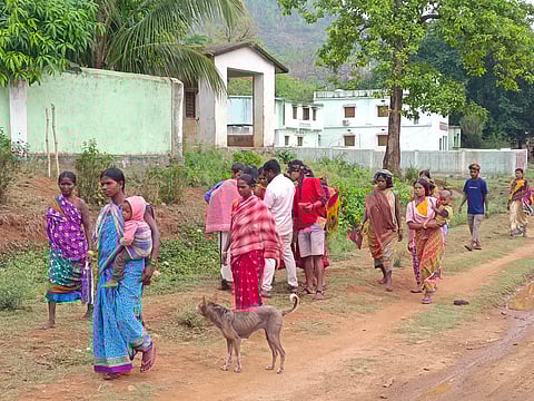 Villagers walking towards the polling booth